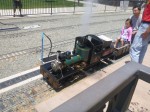 Real miniature steam engine hissing and smoking